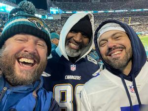 Los Angeles Chargers vs. Jacksonville Jaguars. Fans support on NFL Game.  Silhouette of supporters, big screen with two rivals in background Stock  Photo - Alamy